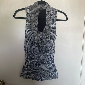 White House Black Market Sleeveless blouse XXS. Pretty, nice condition. Machine